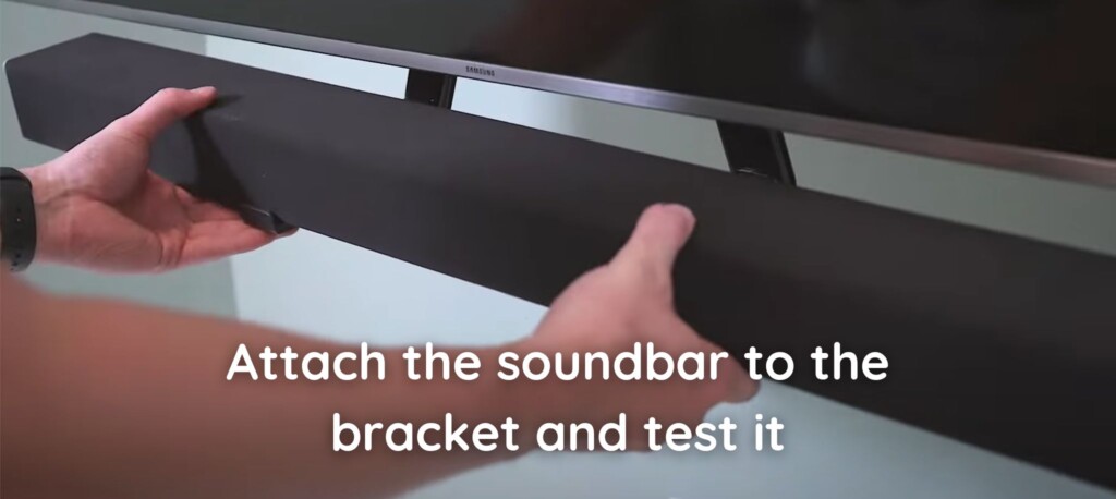Attach the soundbar to the bracket and test it - How to Mount a Soundbar to Your TV?