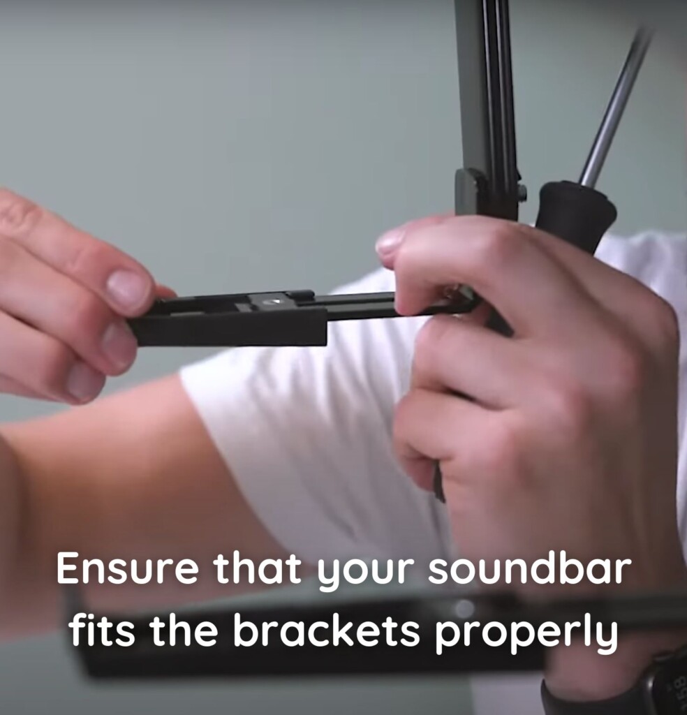 Ensure that your soundbar fits the brackets properly, then re-mount the TV on the wall - How to Mount a Soundbar to Your TV?