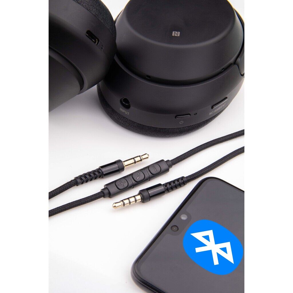 What is the benefit of using both AUX and Bluetooth?
